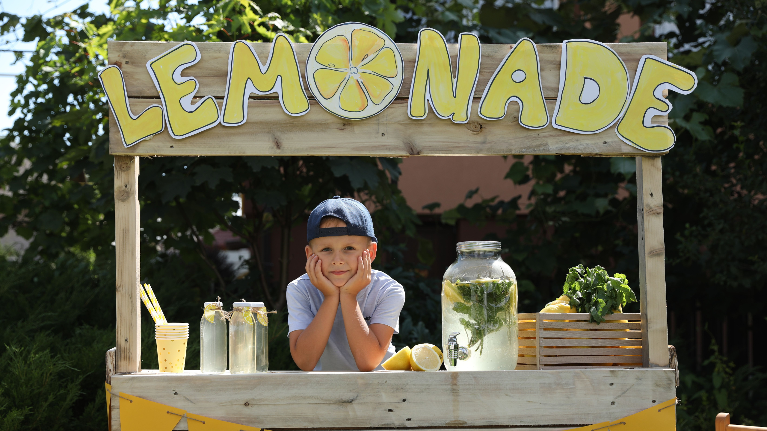 Hand squeezing lemons